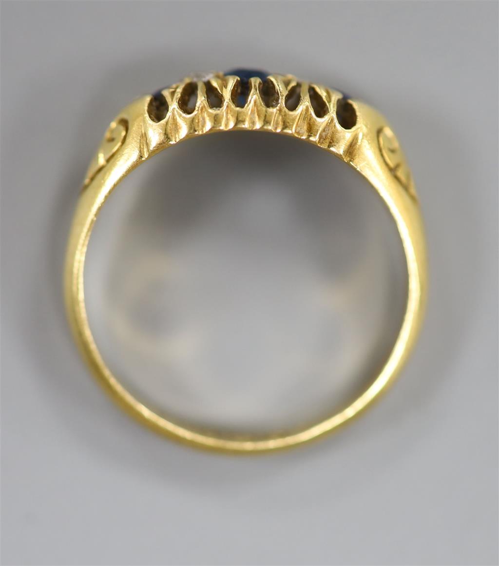 A George V sapphire and diamond ring, 18ct gold shank, size L/M, gross 3 grams.